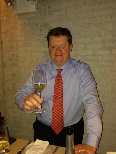 men drink a toast