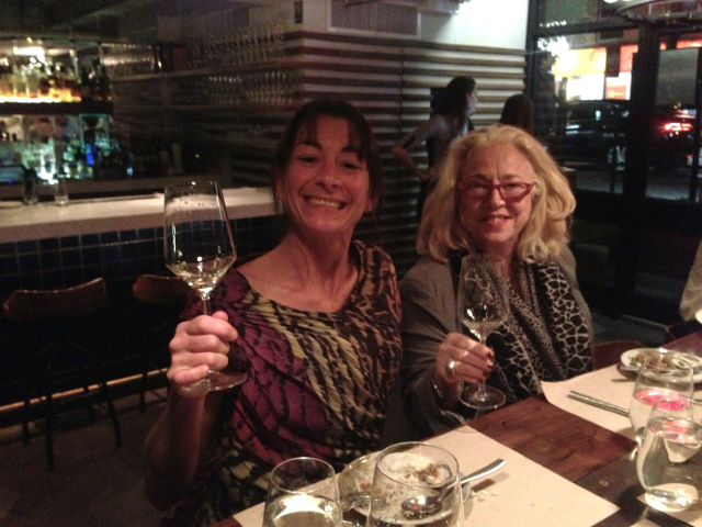 two ladies toasting